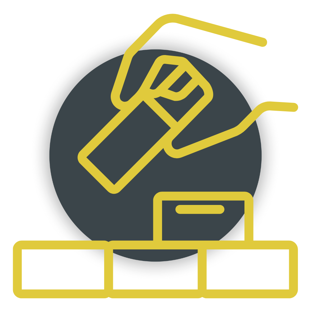 Yellow outline of a hand holding a spray can over a black circle with a white border on a grey background